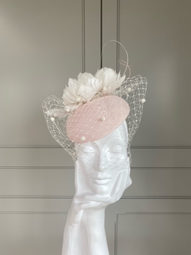 Hat Base: Light Pink, Quills: Light Pink, Feather flowers; Ivory, Veil: Ivory